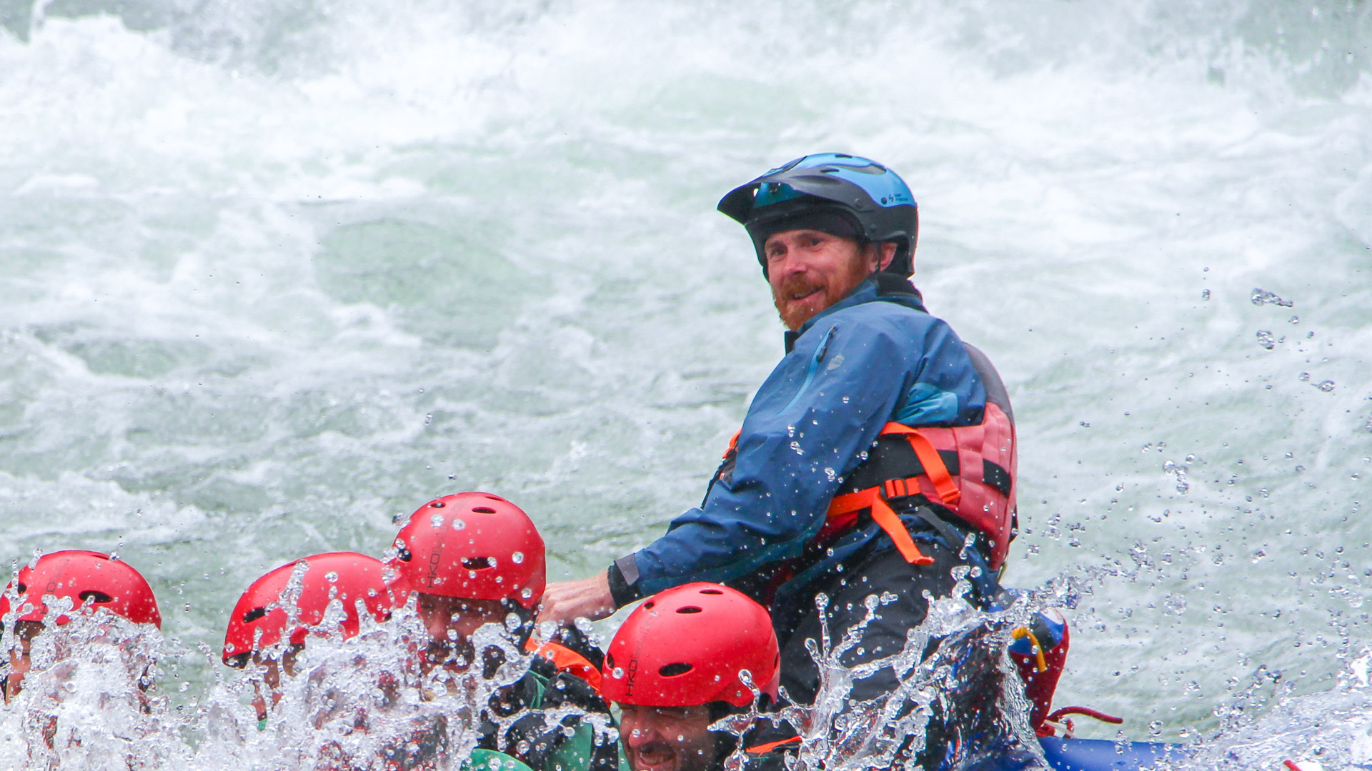 Nathan Topp guiding a raft on the Grey River / Māwheranui